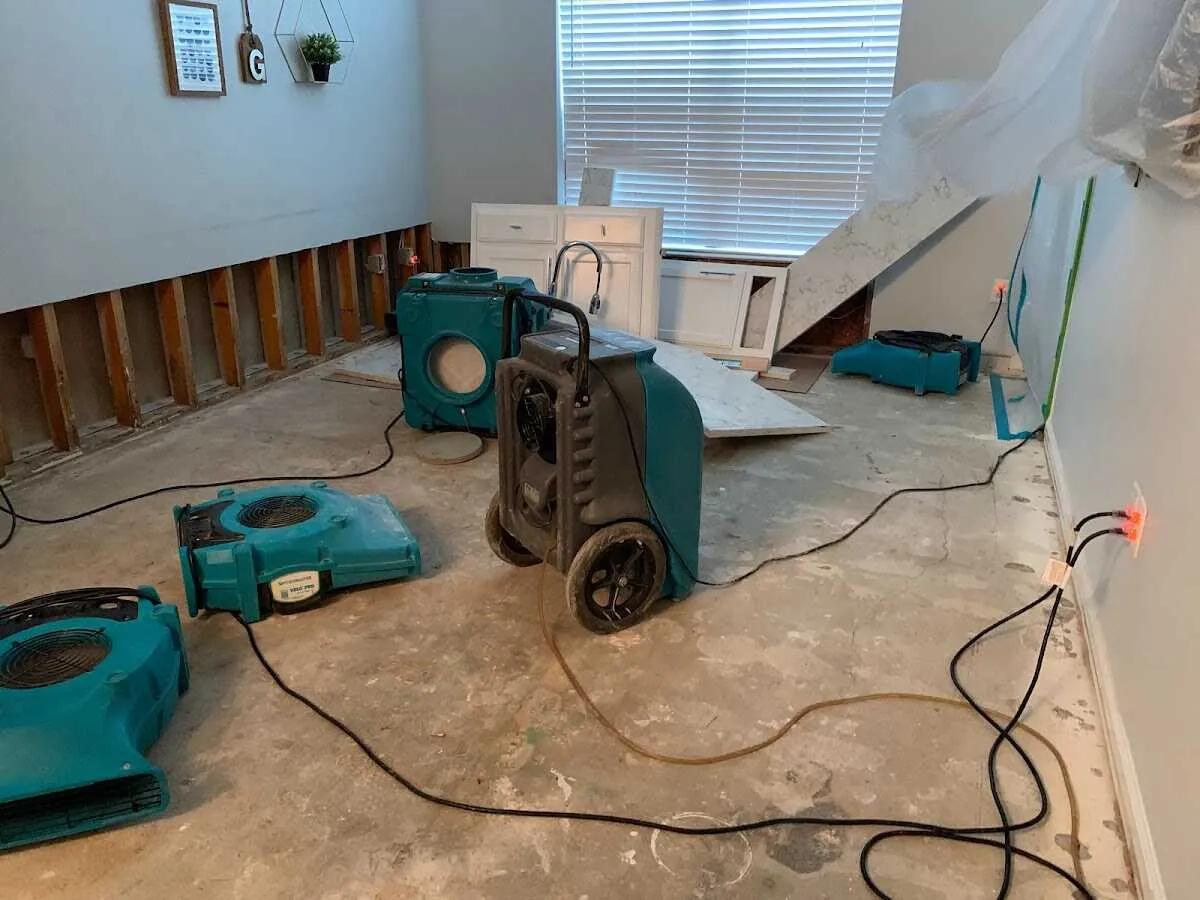 Dehumidifier in flood-cut room for Water Damage Restoration in Clifton